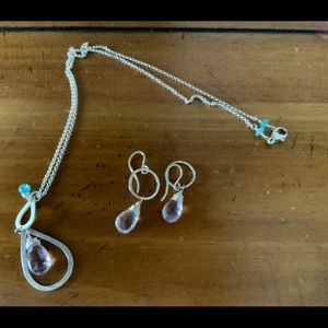 Sterling silver jewelry set with amethyst drops and turquoise accents.